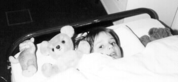 [1970: Tilman in bed with Teddy-Bears]
